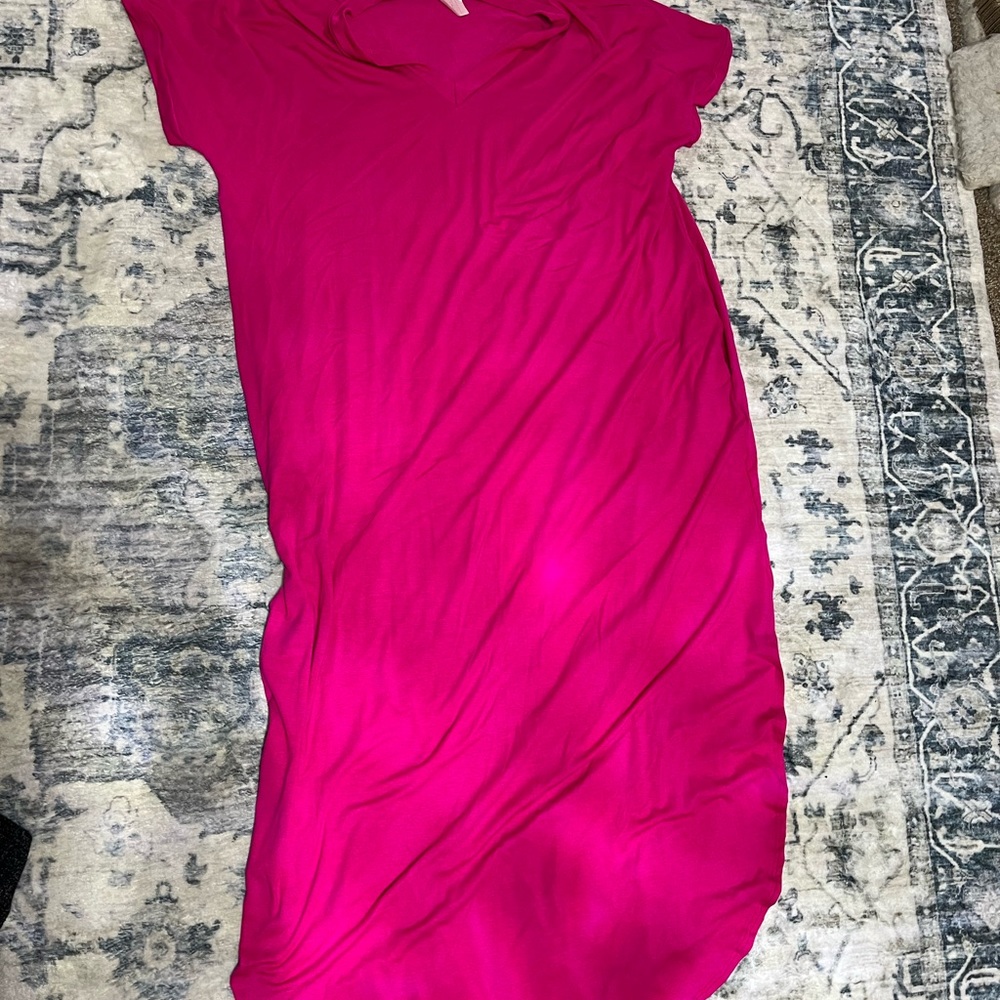Fuscia dress small smudge stand on back
